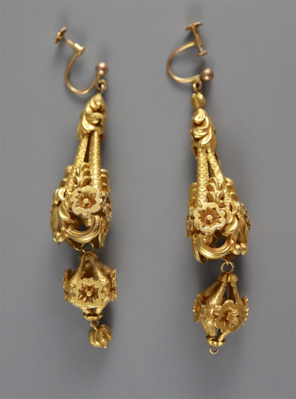 A pair of Victorian gold (tests as 18ct) pendeloque earrings, the suspensions marked as 9ct,